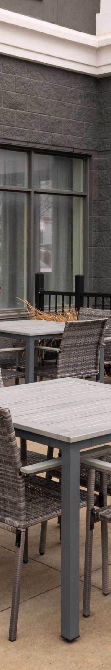 Outdoor patio with tables and chairs