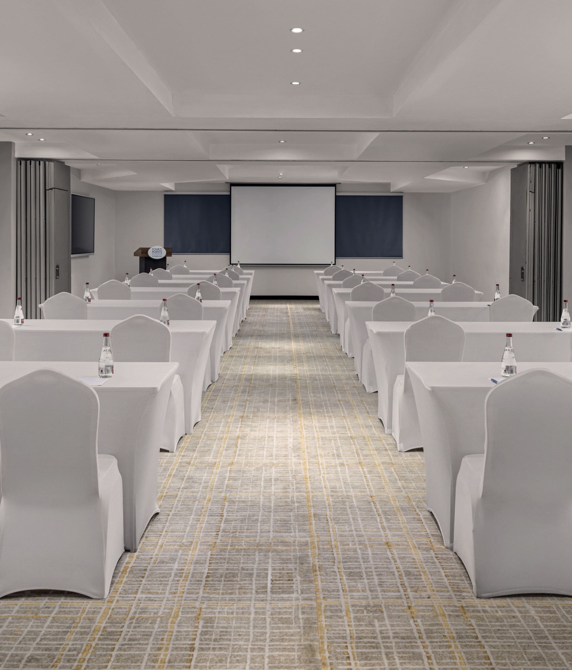 Projector, seating chairs and covers, table