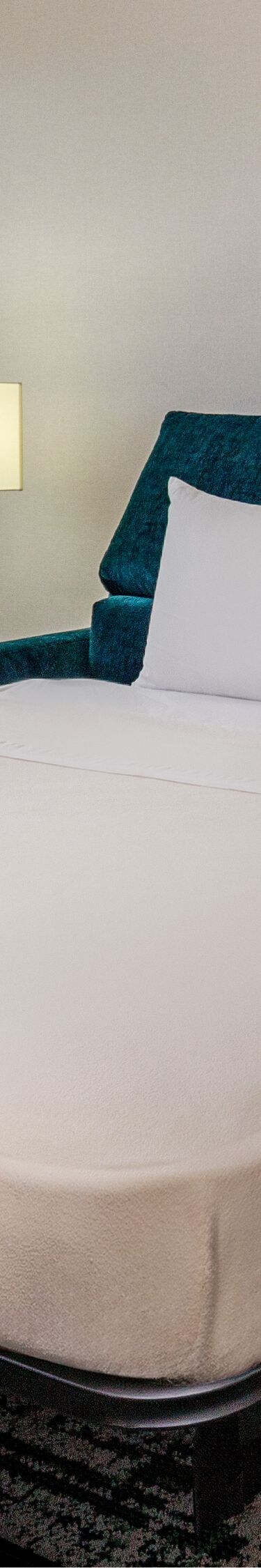 Sleeper sofa opened into a bed in a suite