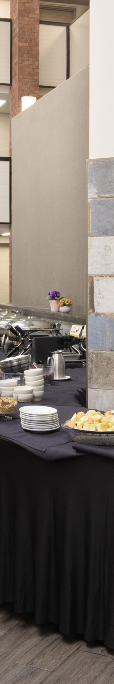Breakfast area located in hotel atrium