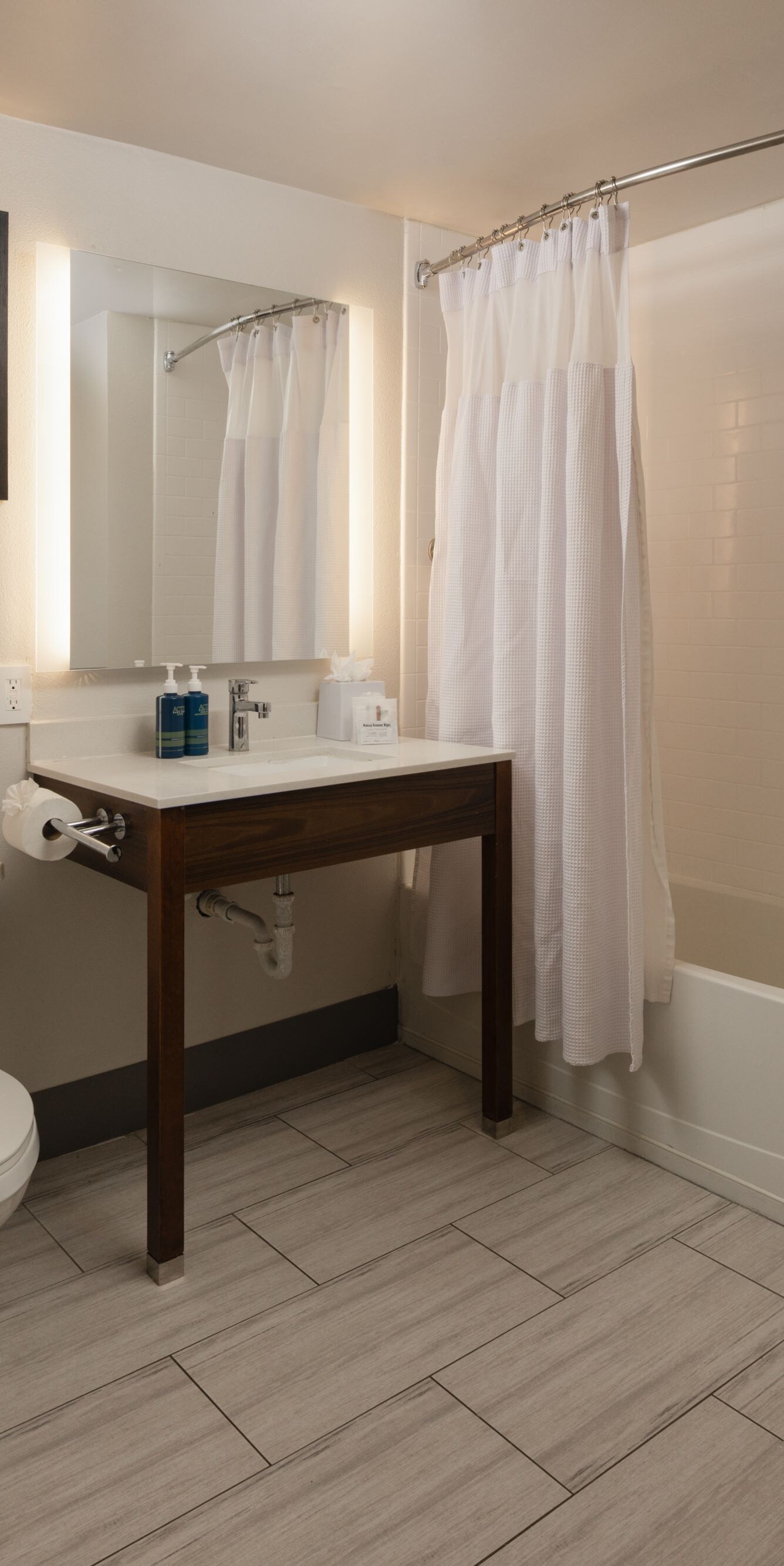 Guest room bathroom with tub/shower combo