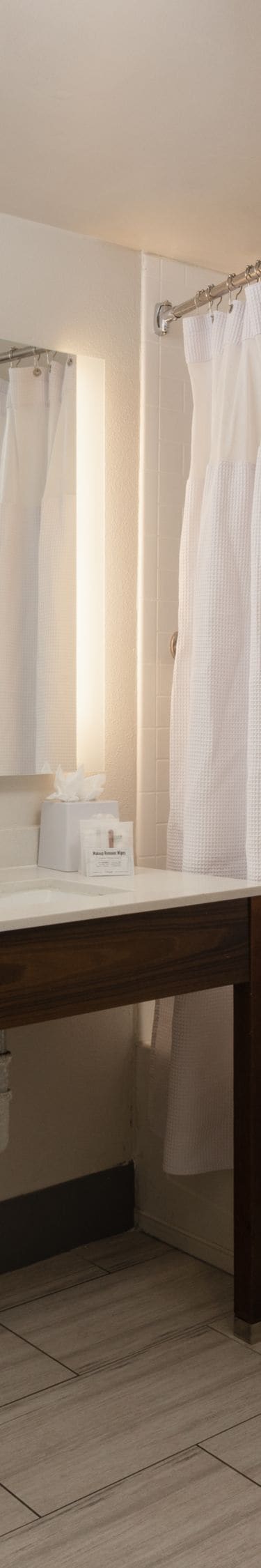 Guest room bathroom with tub/shower combo