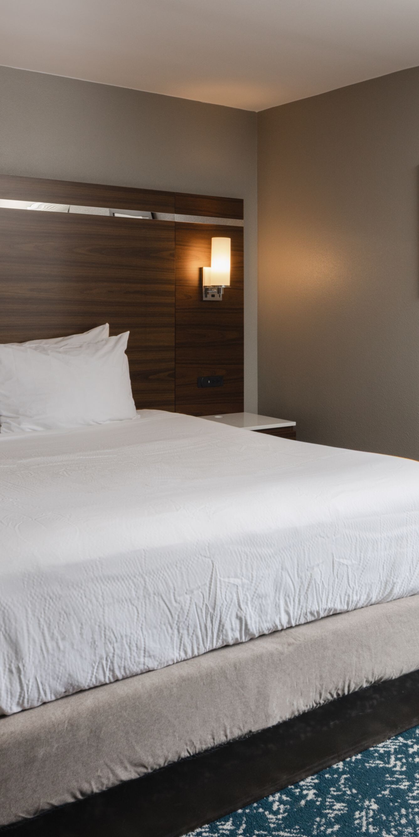 Suite guest room sleeping area with king bed