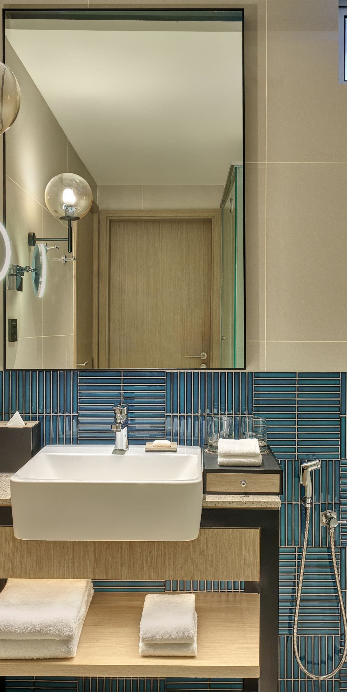 bathroom with single sink vanity and mirror