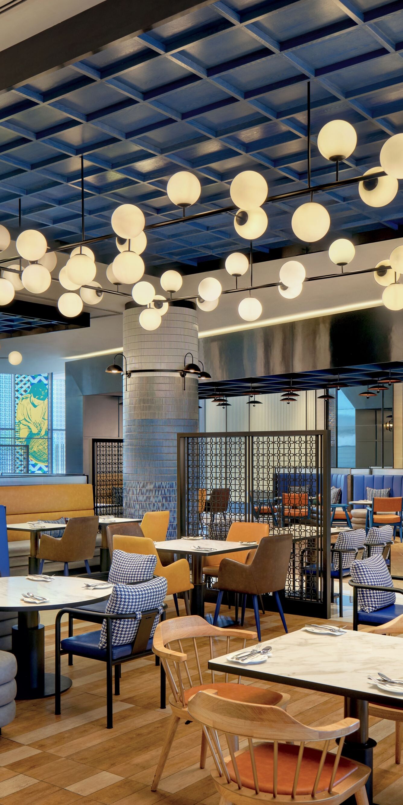 Restaurant with blue booths and lighting