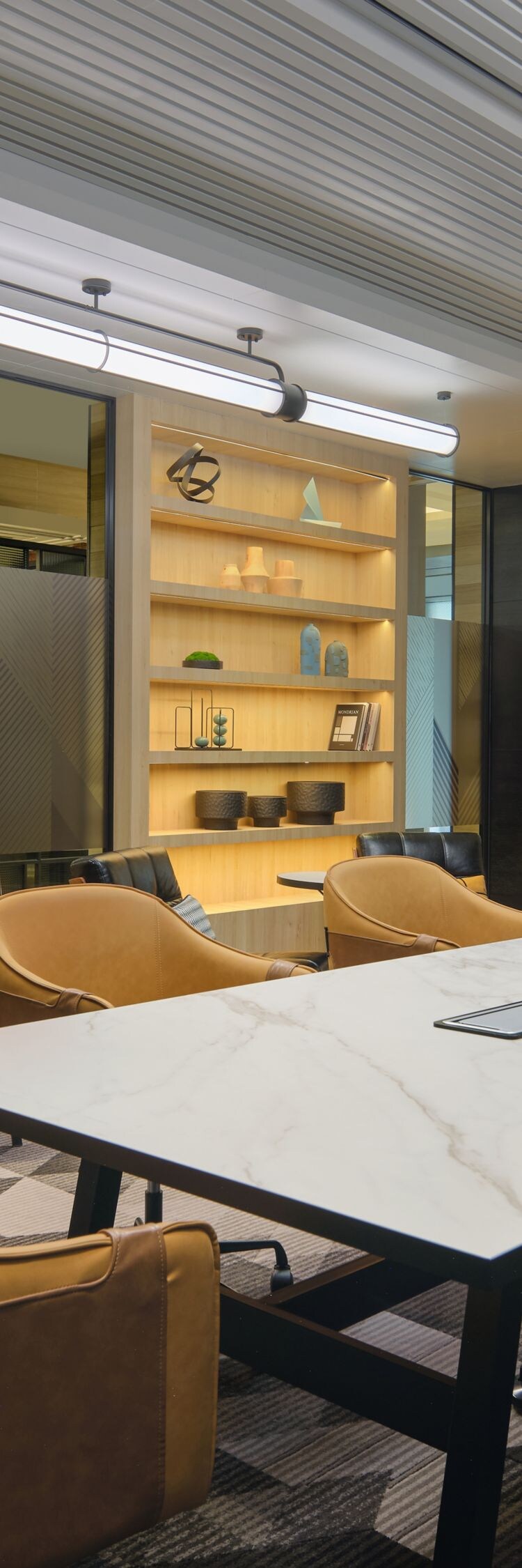 Meeting room with marble table and art