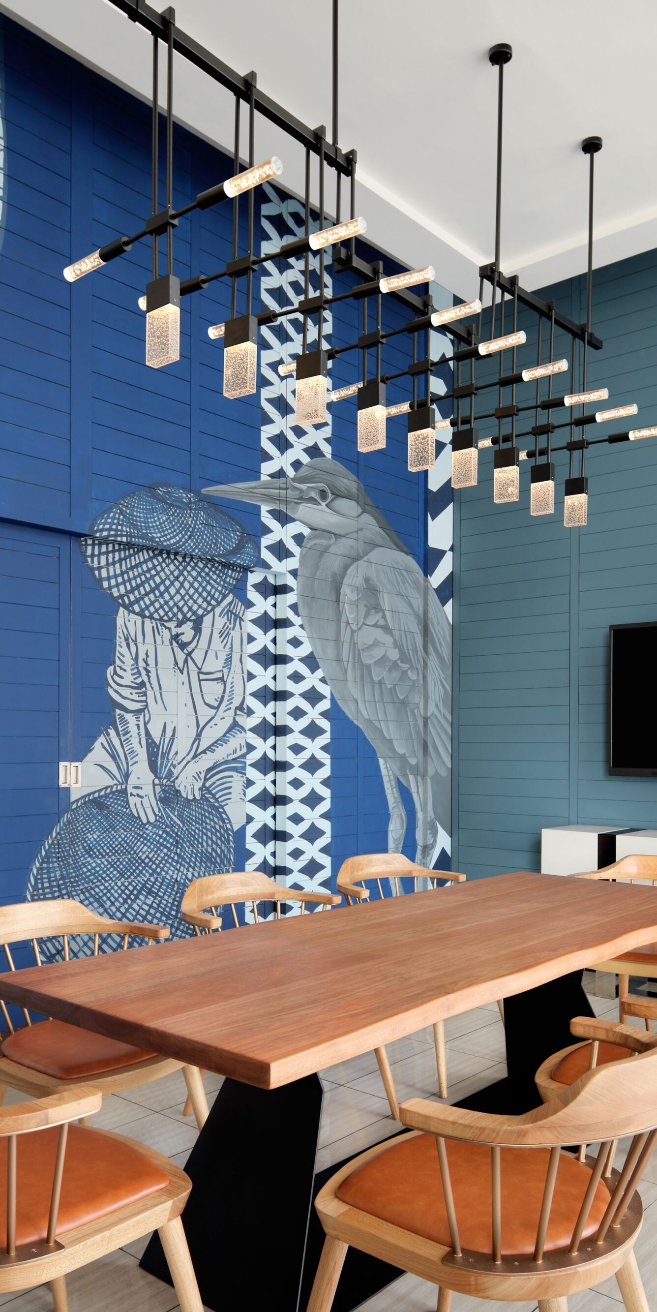 Meeting space with mural and wood table