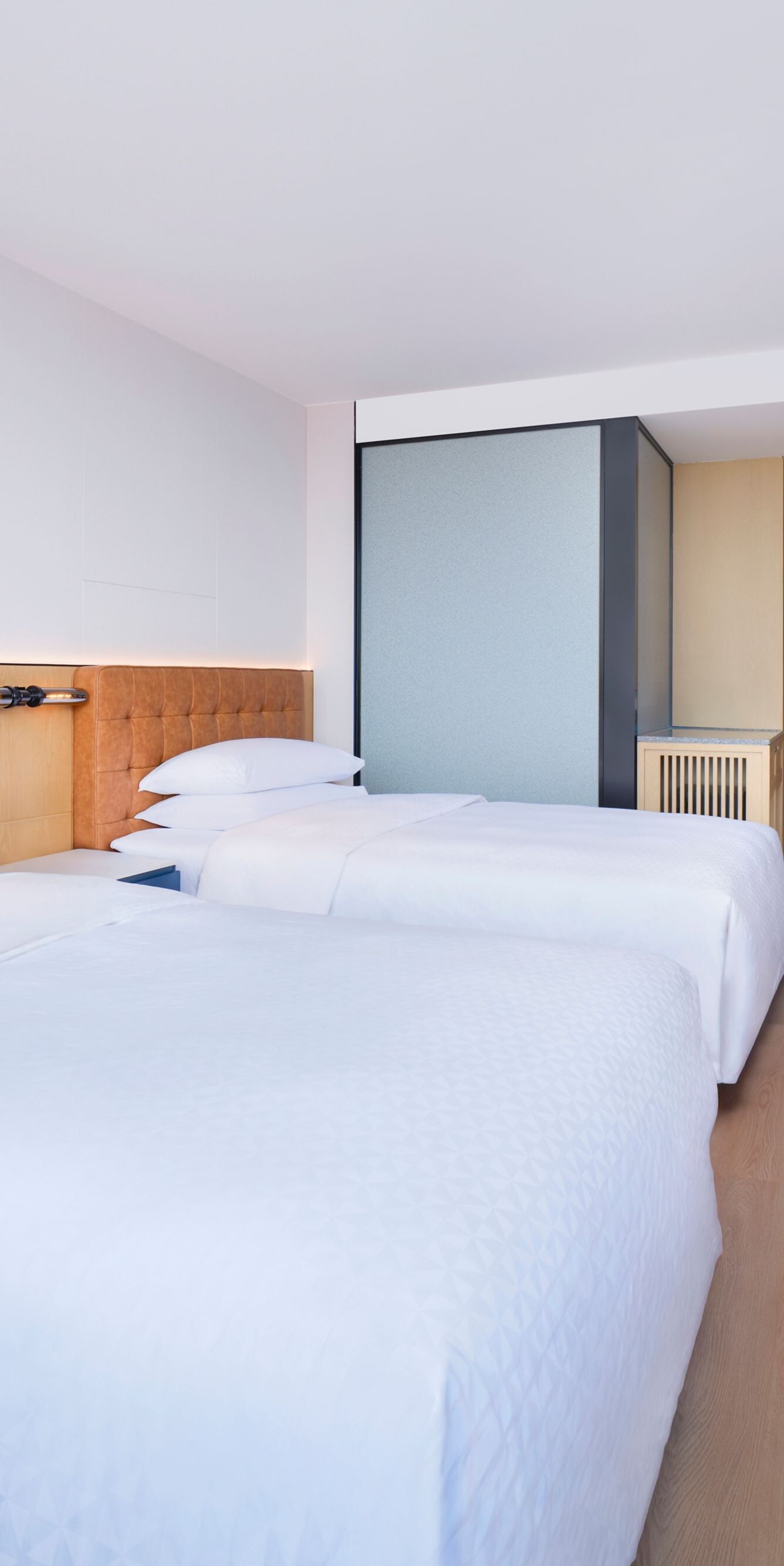 Spacious classic twin hotel room with two beds