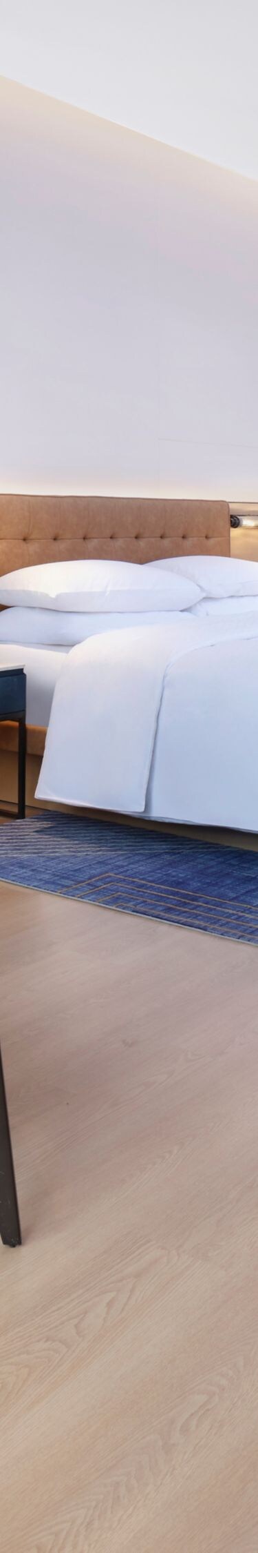 Hotel room with king bed and seating area