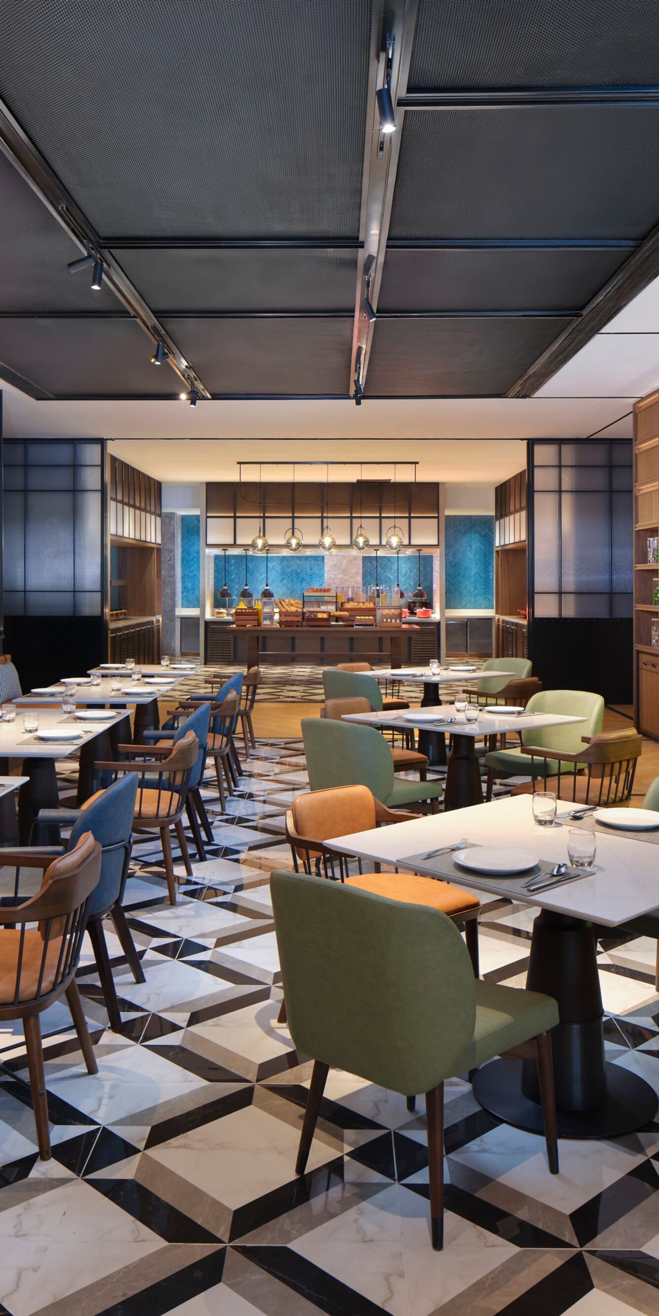 Stylish hotel dining room with set tables