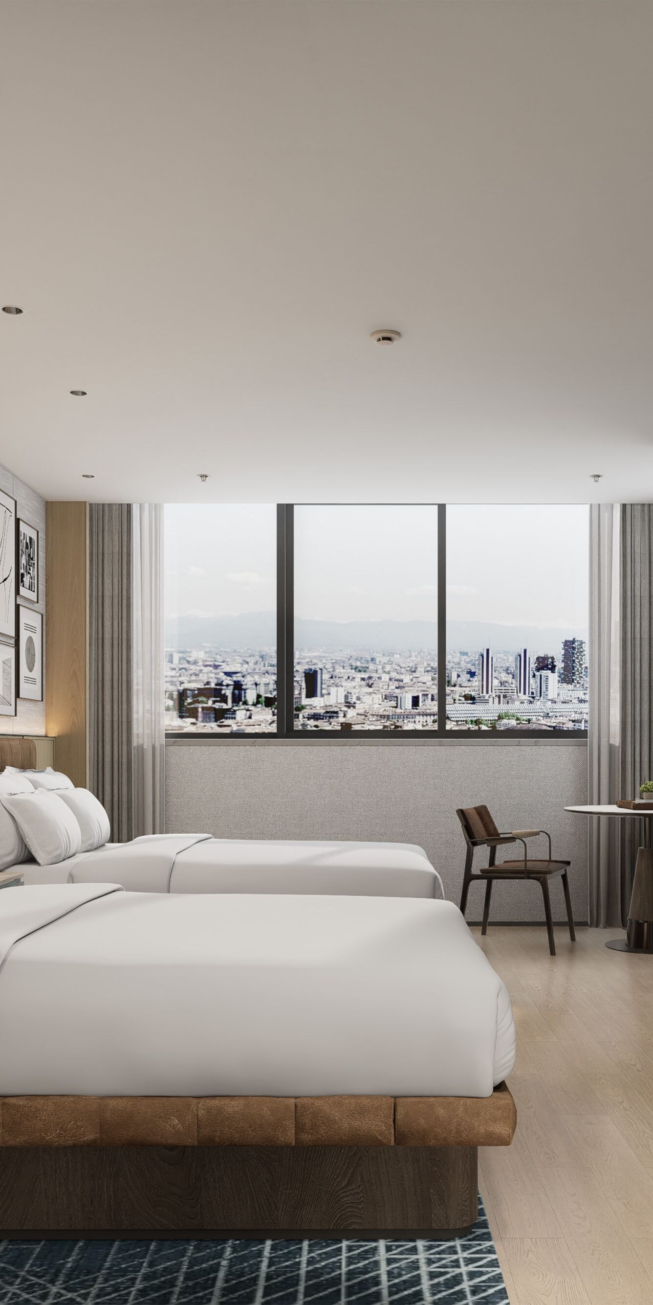 2 double beds, bench, TV, chair, table, city view