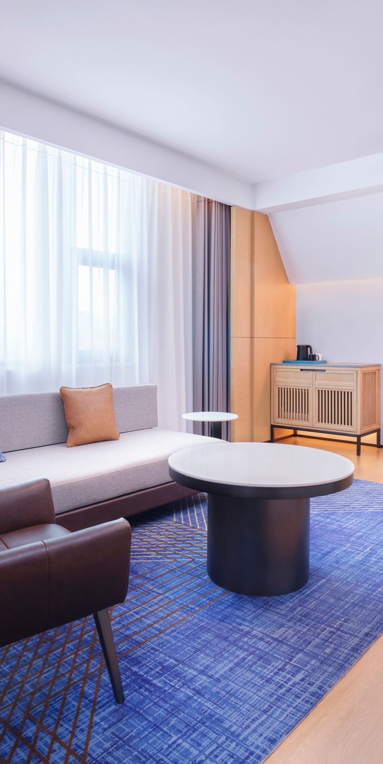 Living room of Executive Suite, sofa and tables