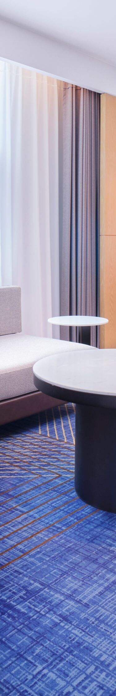 Living room of Executive Suite, sofa and tables