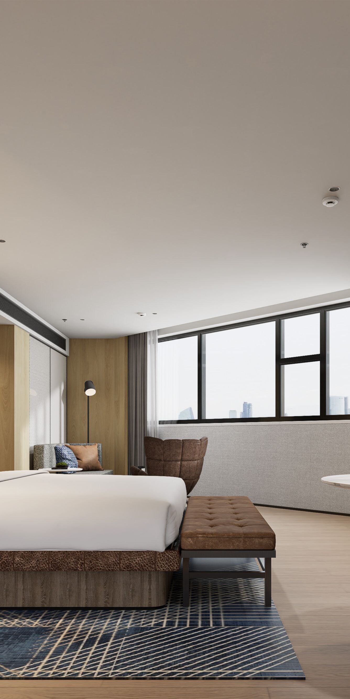 1 king bed, table, chair, TV, window, city view