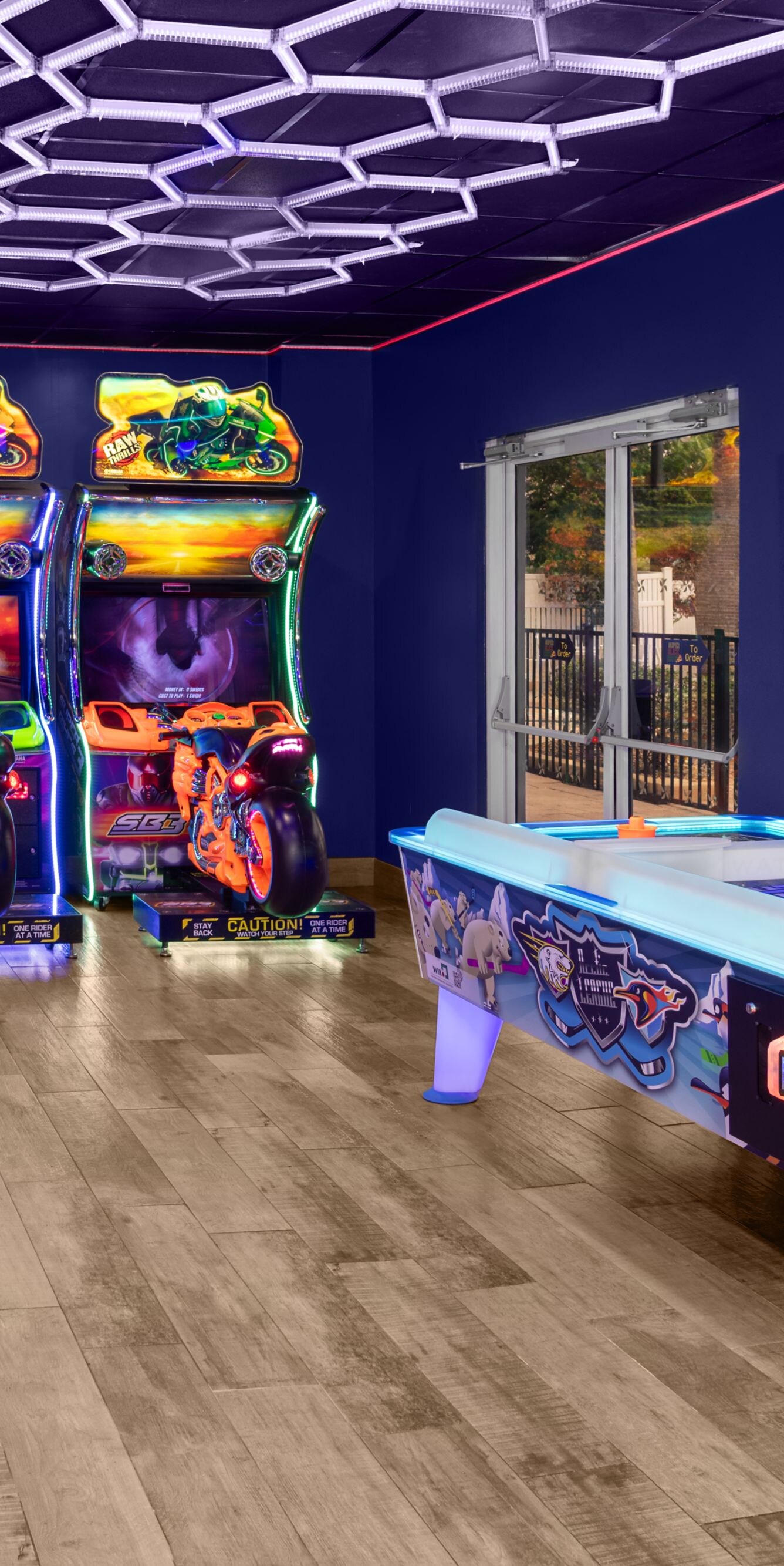 Arcade includes air hockey & other video games