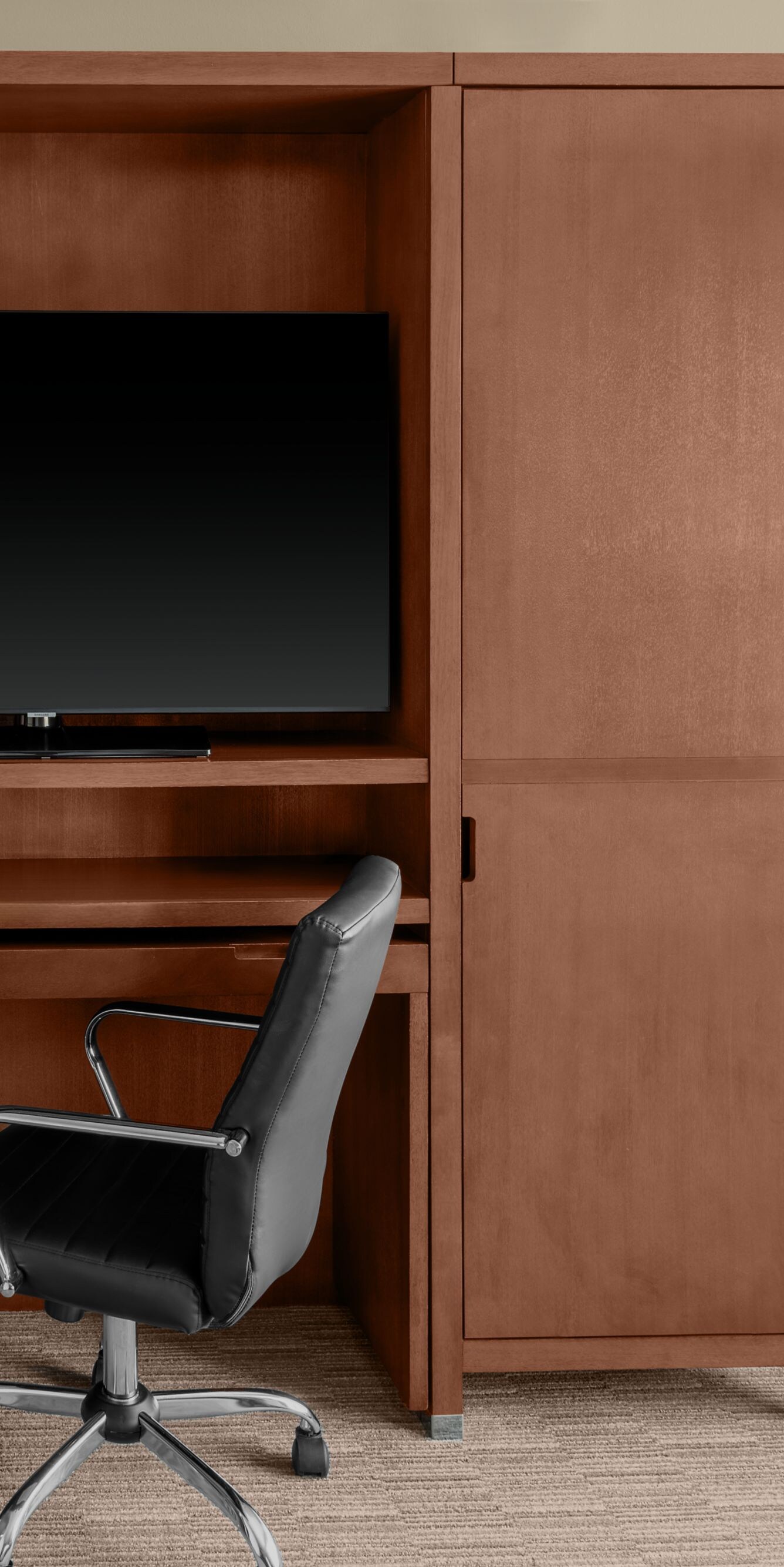 Accessible guest room desk with TV & in-room safe