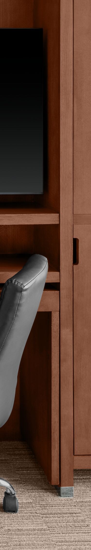 Accessible guest room desk with TV & in-room safe