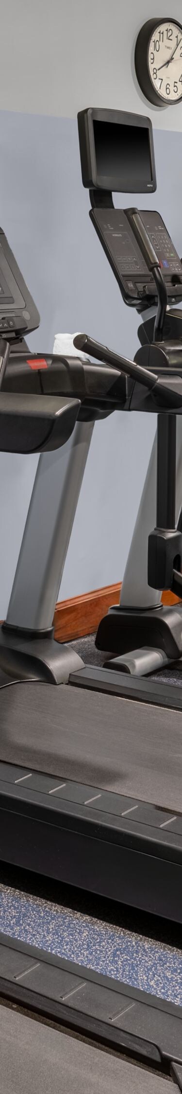 Fitness Room with cardio and weights.