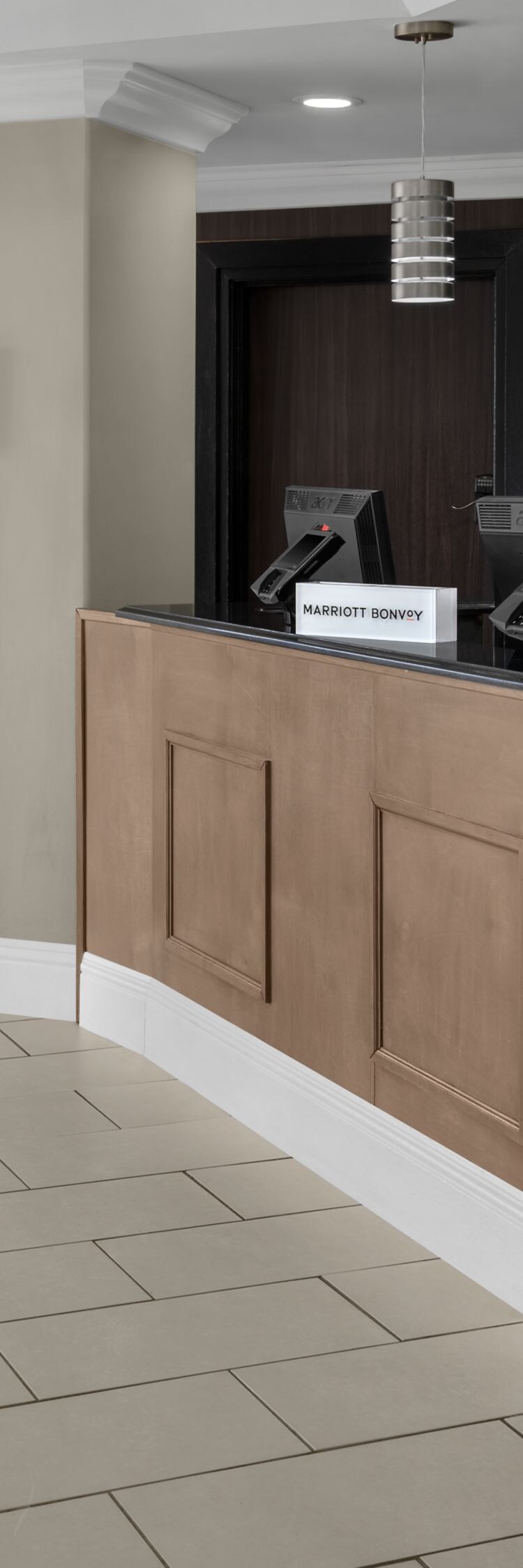 Hotel front desk with wood counter