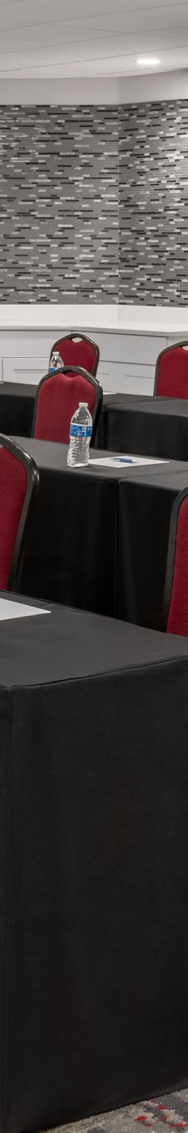 Meeting room with rows of chairs