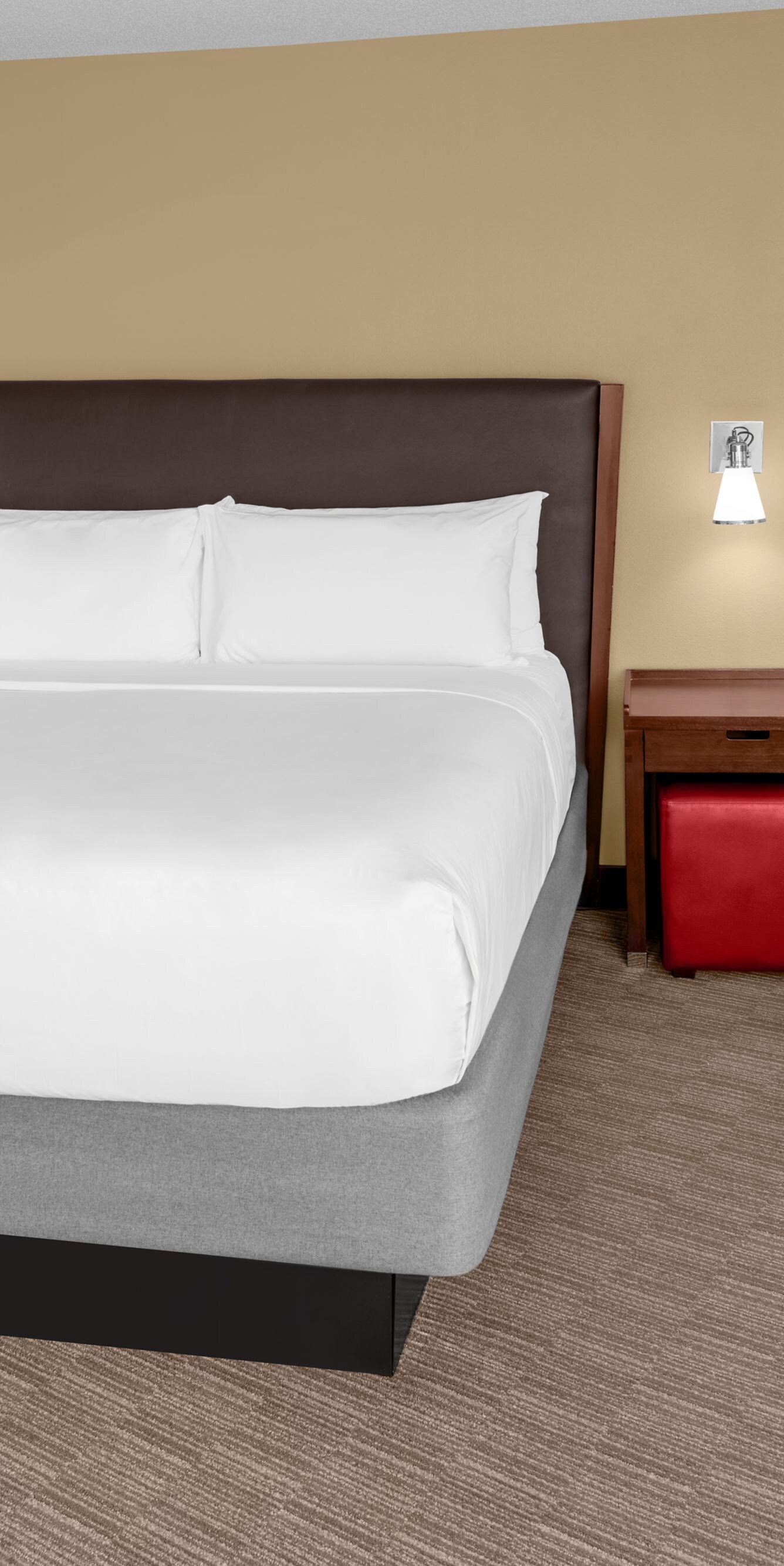 King guest room with bed and seating