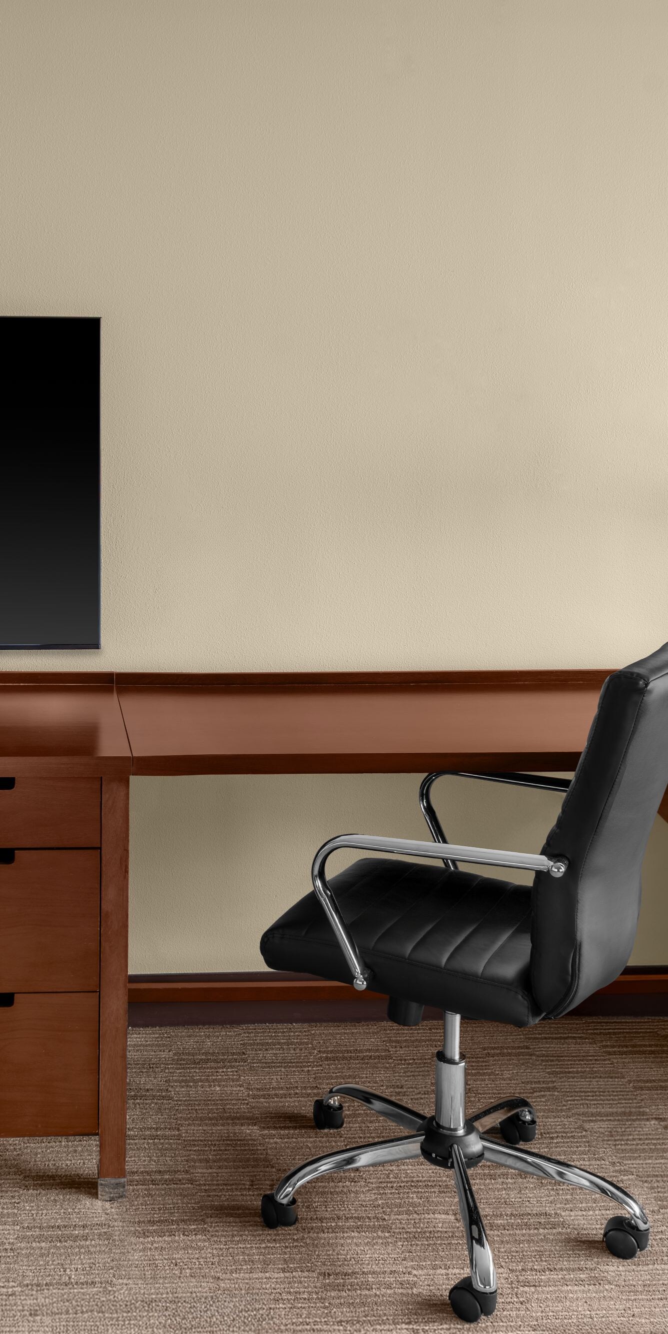 Room amenities with TV and desk
