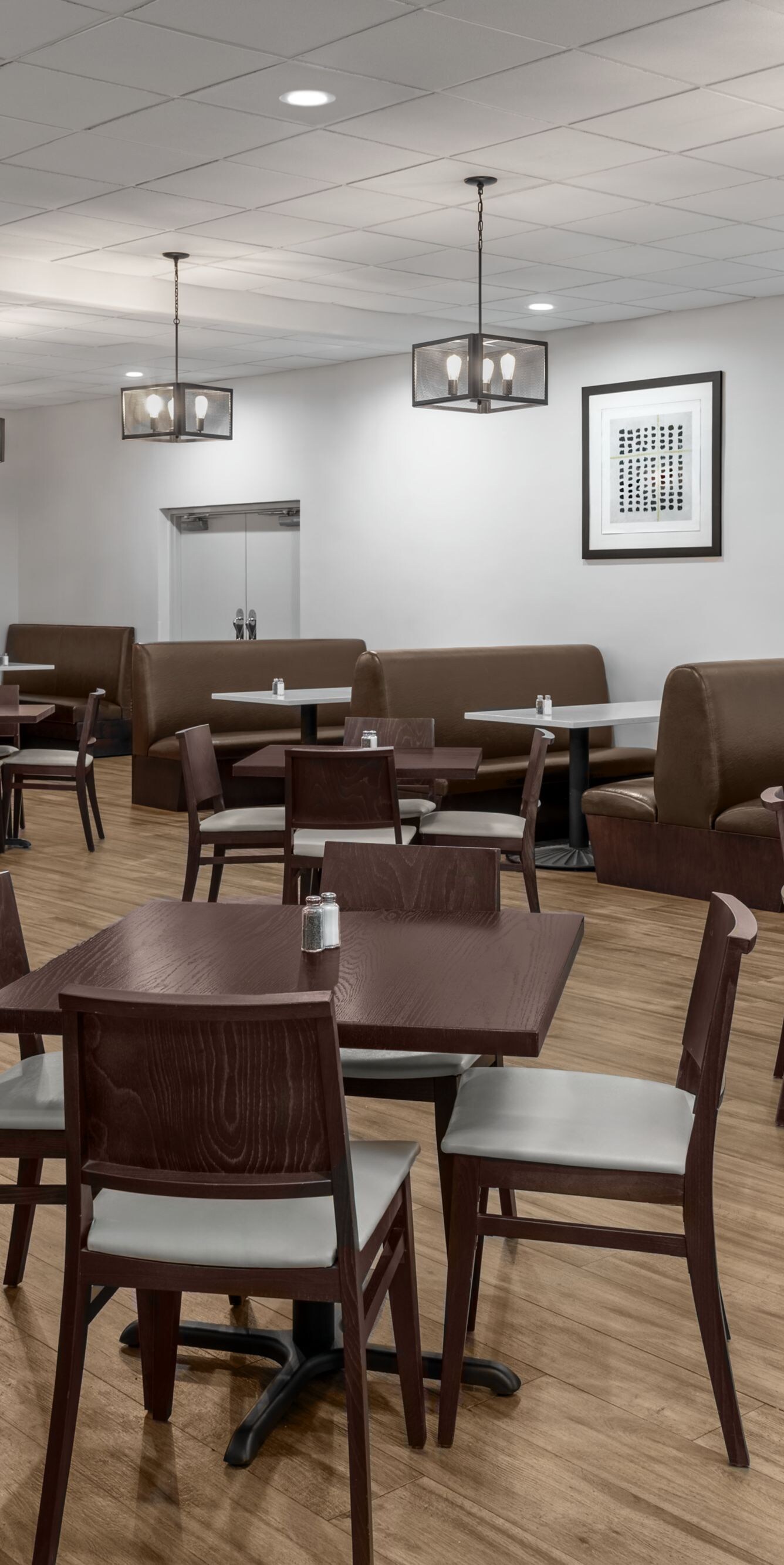 Cafe seating area with tables and chairs