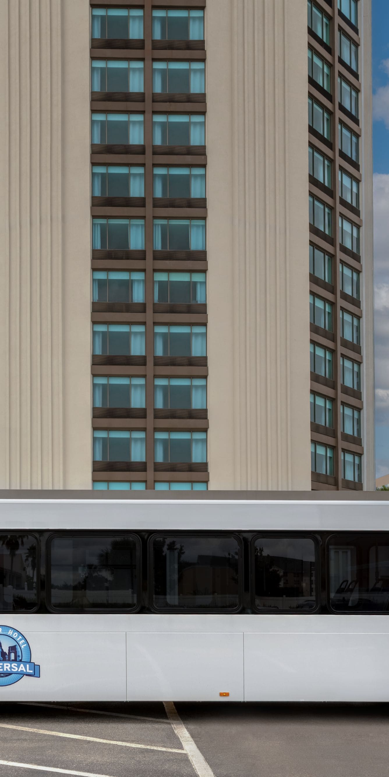 Hotel shuttle bus outside building