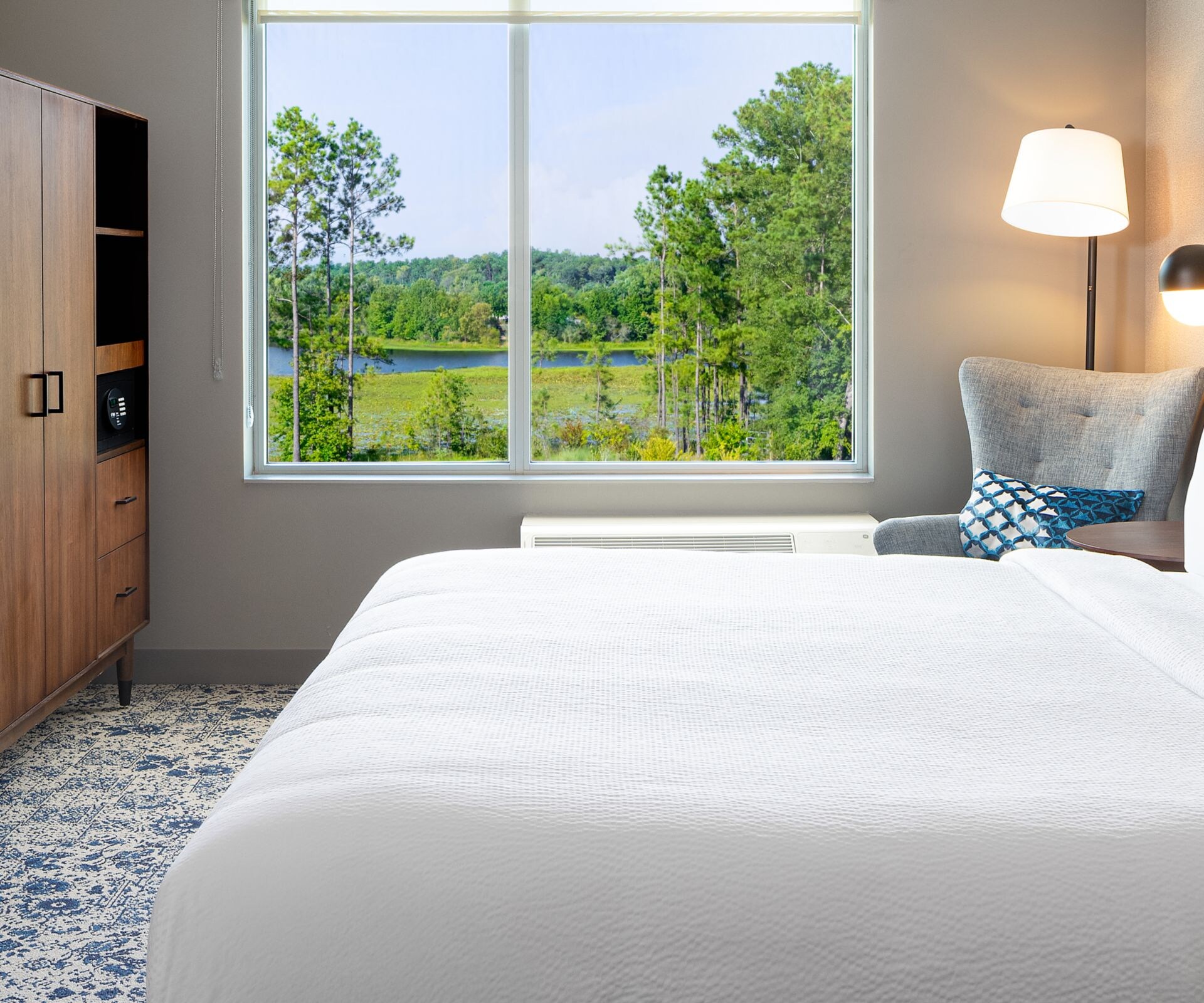 1 King Bedroom Suite with Golf View, TV & more.