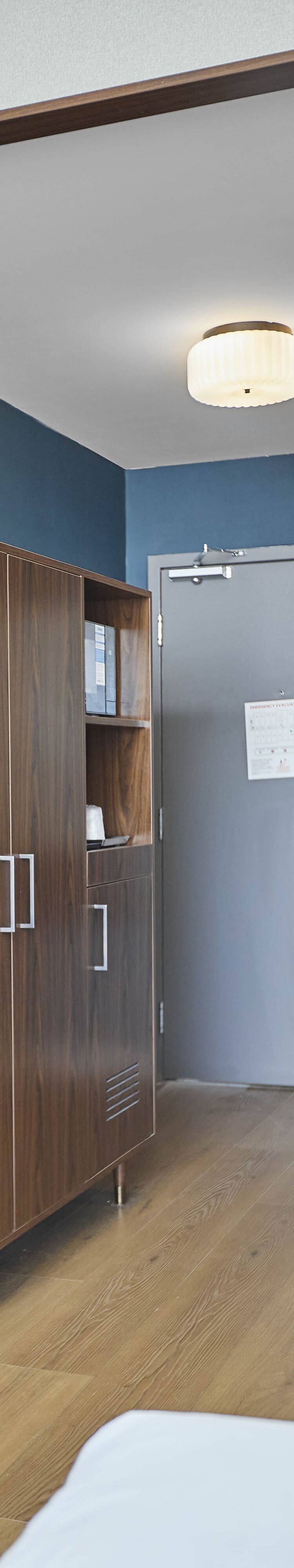Armoire cabinet has mini-fridge, microwave & more.