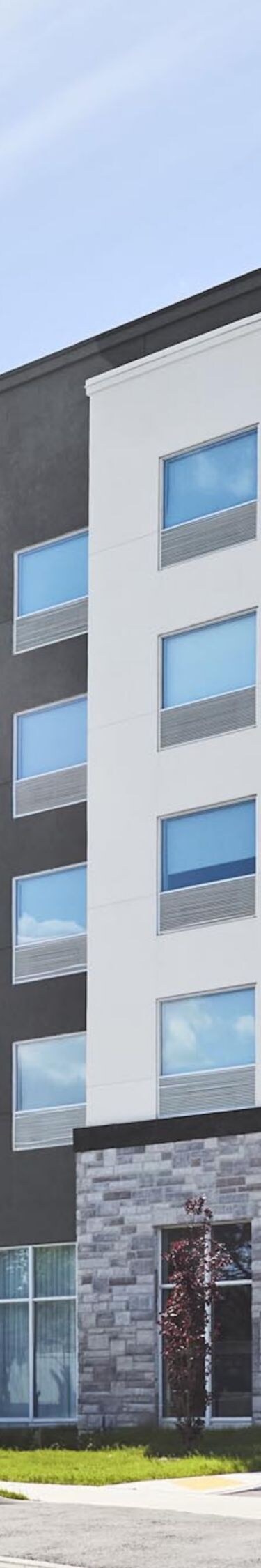 Modern exterior design welcomes guests to Oakville