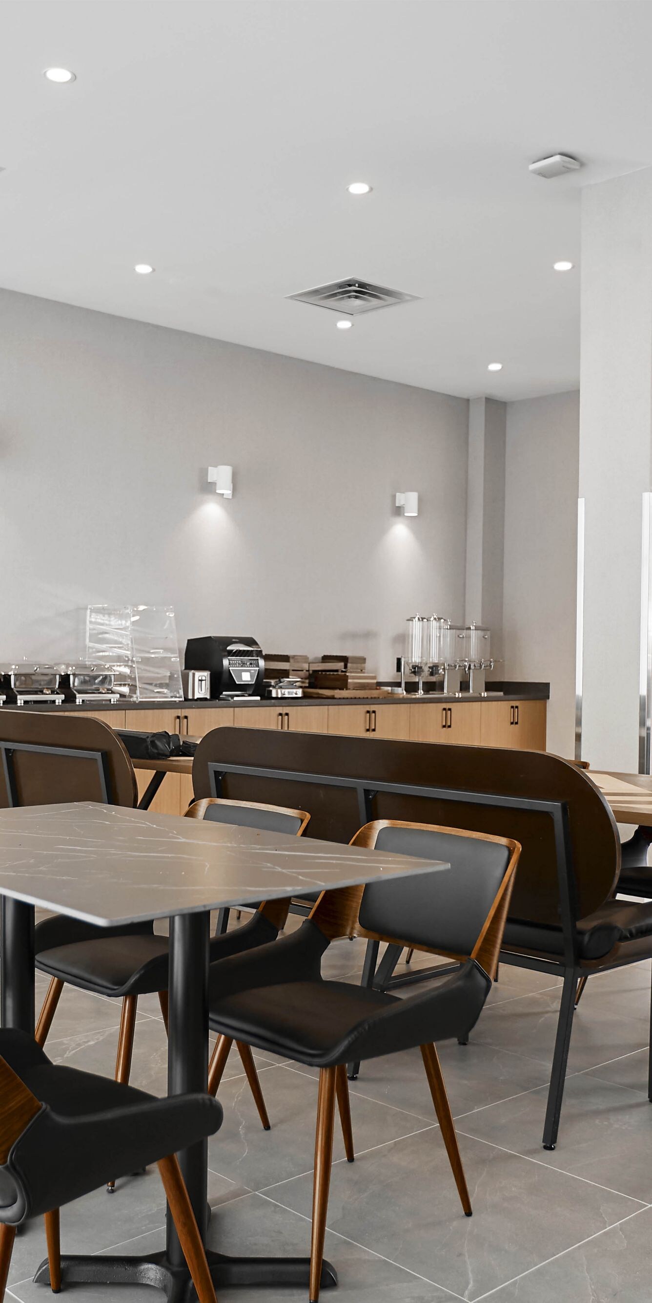 Breakfast buffet and open seating area for dining