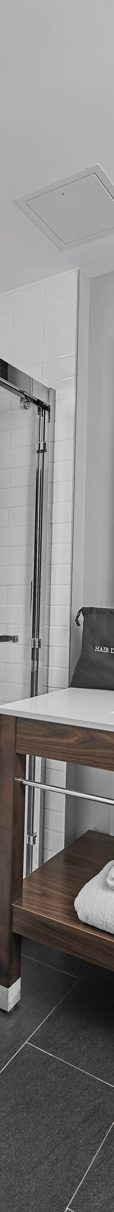 Walk-in shower with vanity