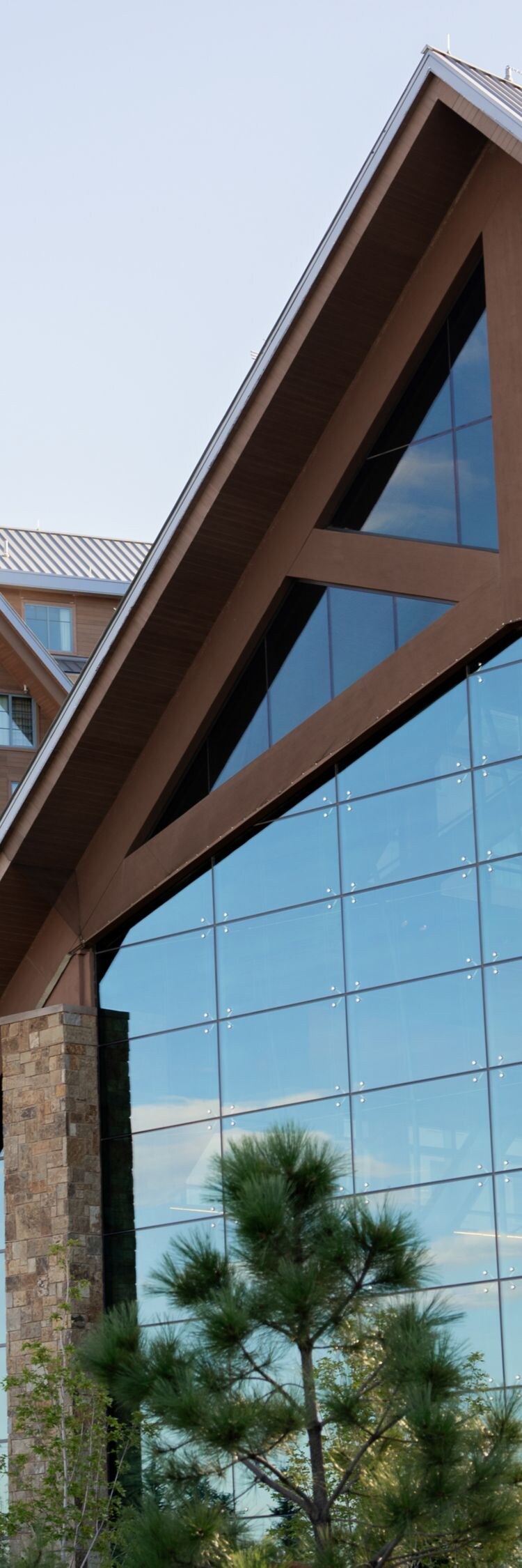Official Gaylord Rockies Resort exterior photo with glass-fronted lodge architecture