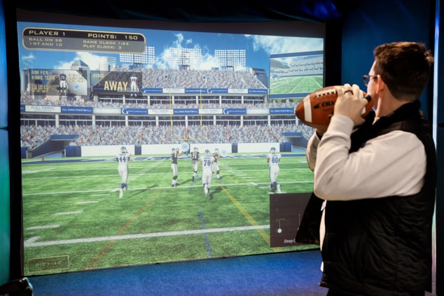 A man playing a virtual football game