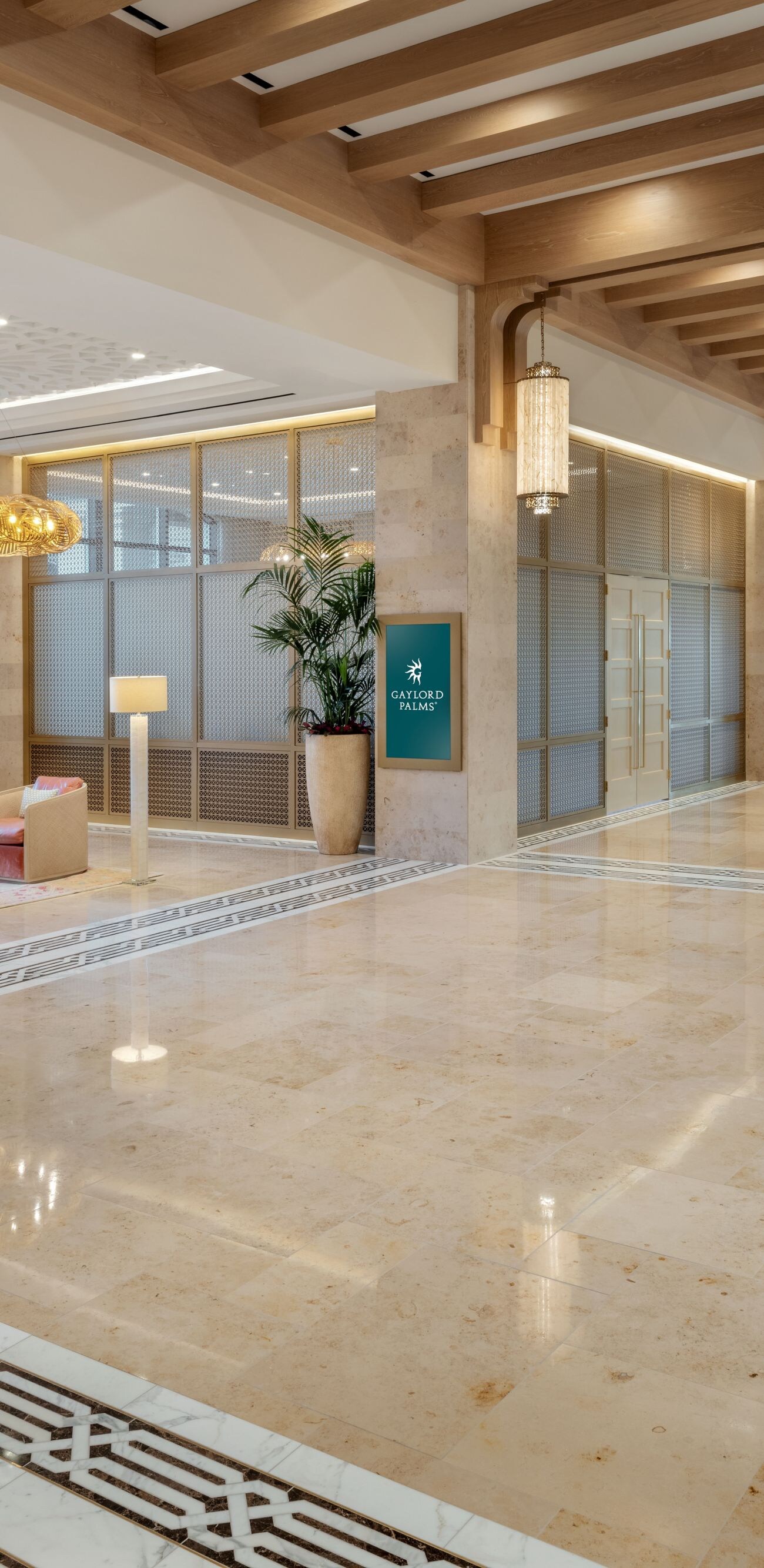 Hallway of hotel lobby with lounge furniture 
