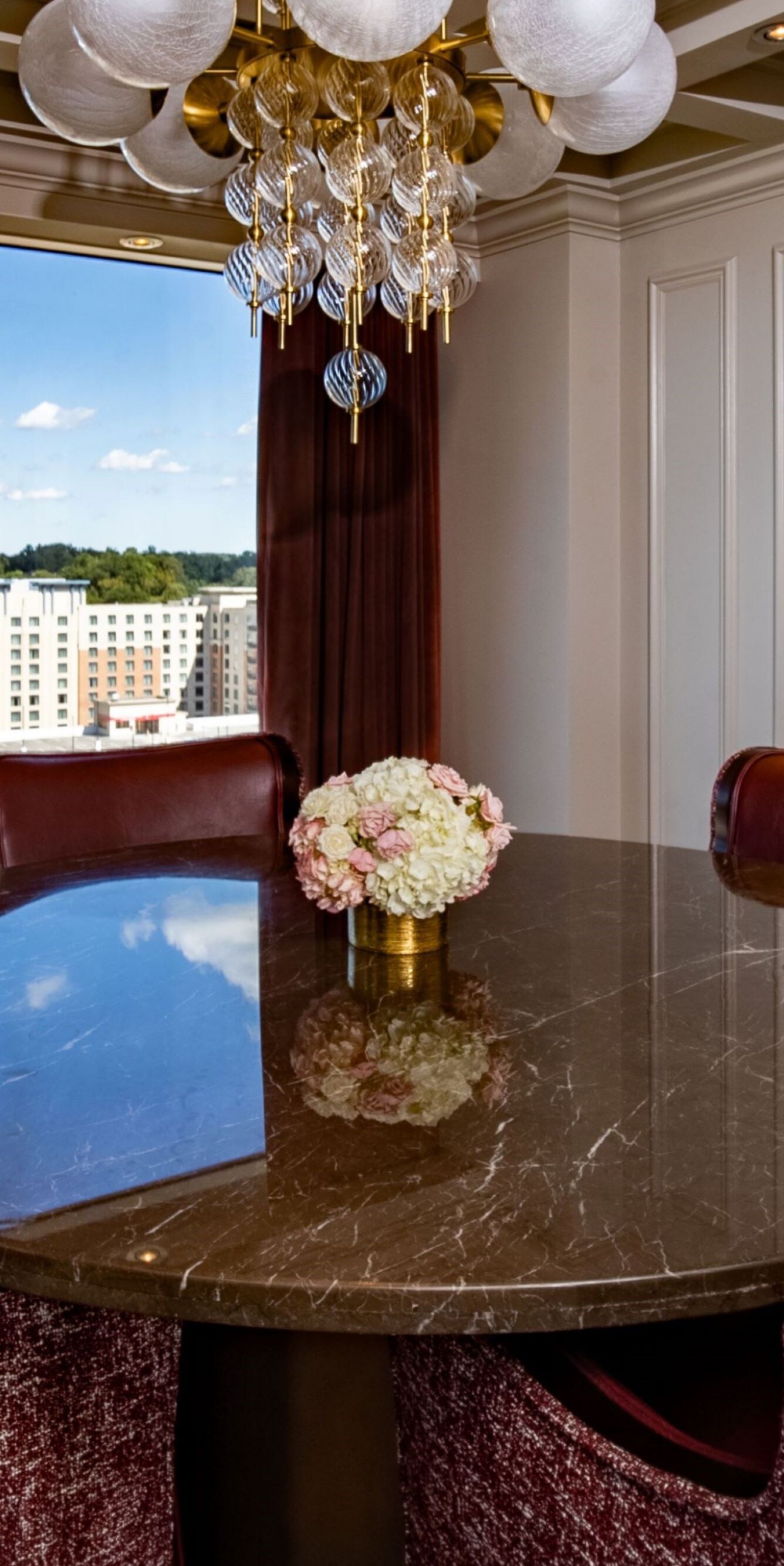 suite dining area with four chairs