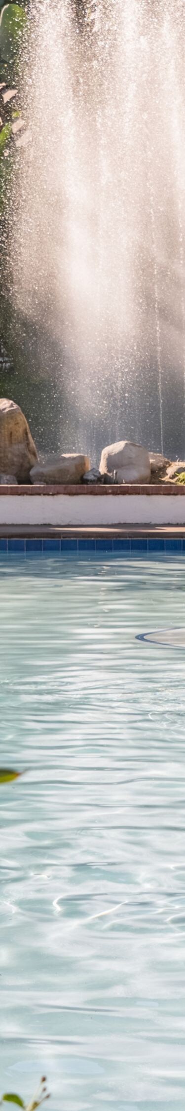 Mineral spring pool featuring clear blue water