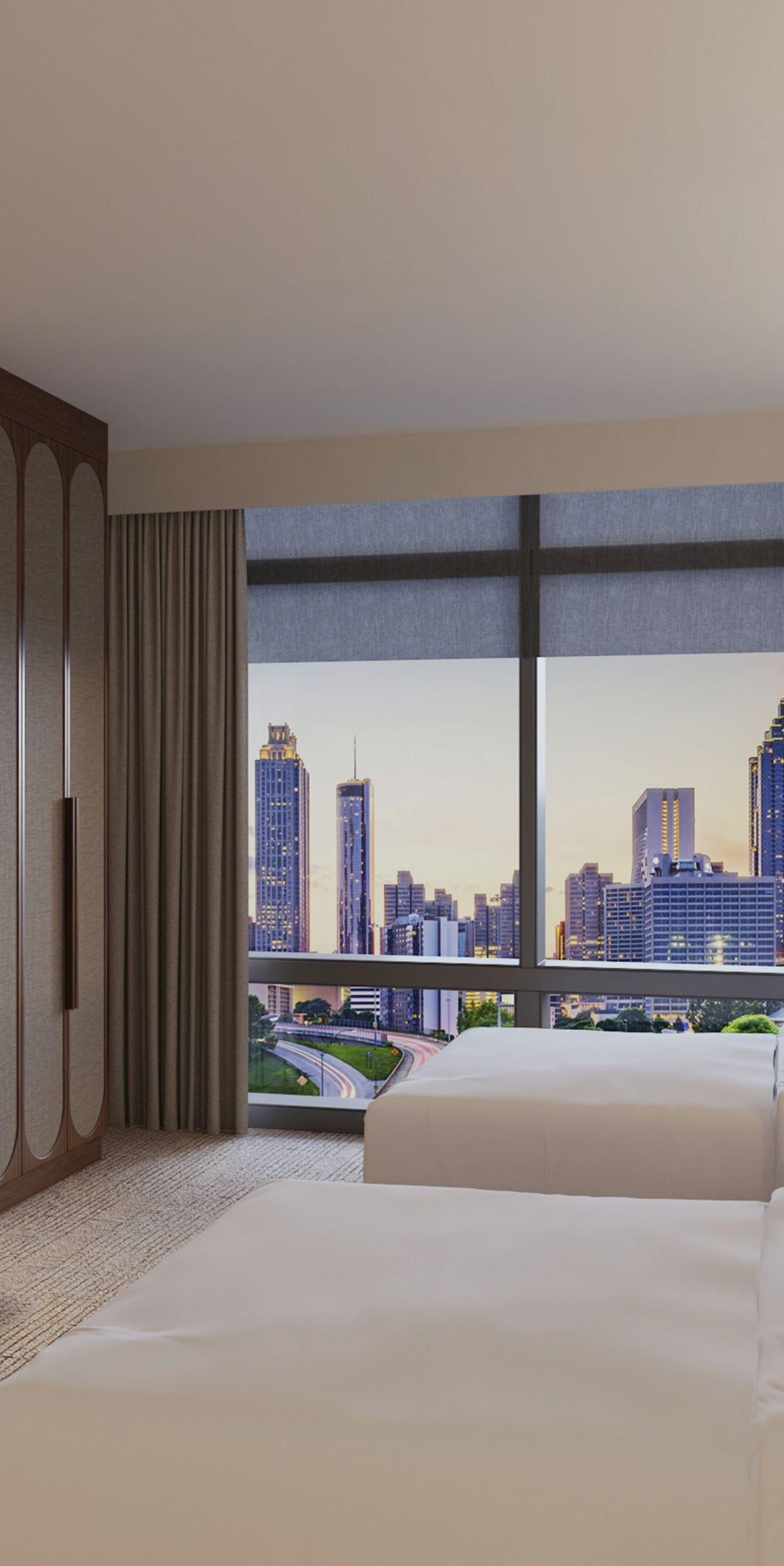 two queen beds, wardrobe, city view
