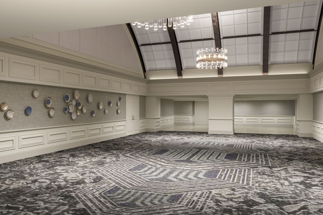 large meeting space with chandeliers