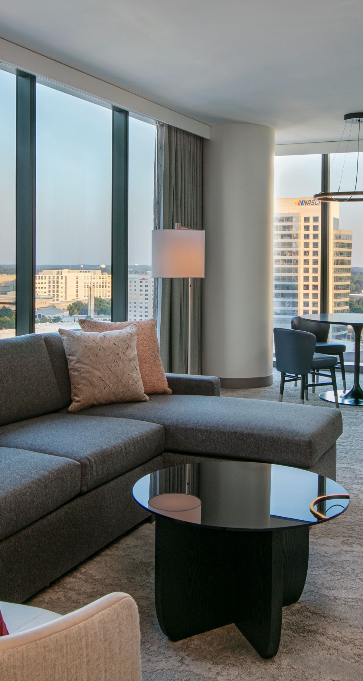 Executive suite living area at JW Marriott Charlotte with spacious furnishings and skyline views