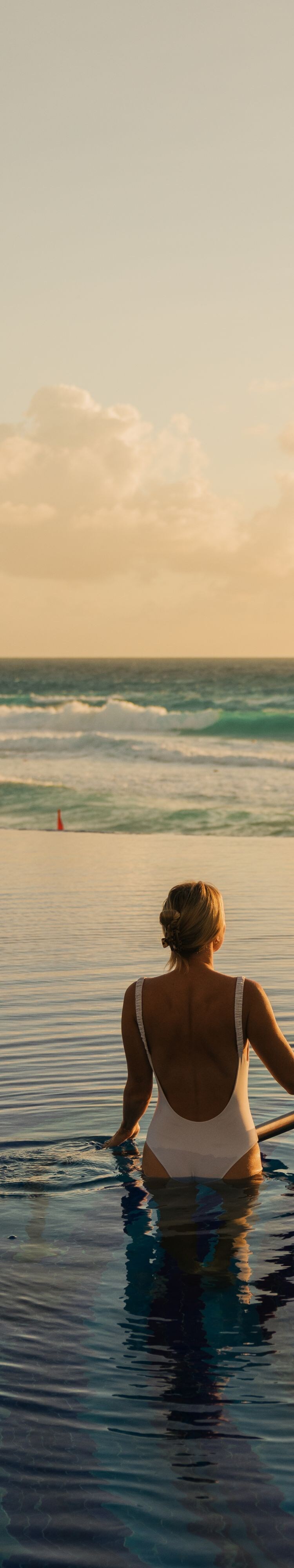 Infinity pool experience facing the Caribbean Sea