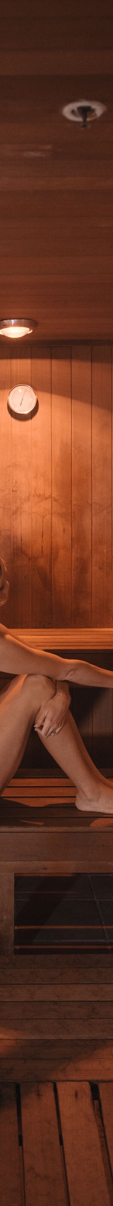 Guest relaxing in the spa sauna at JW Cancun