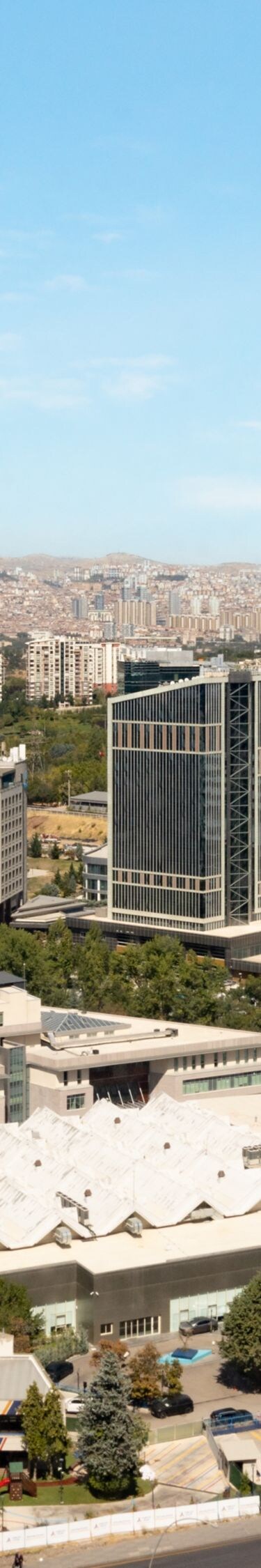 Sunny cityscape with modern glass office buildings