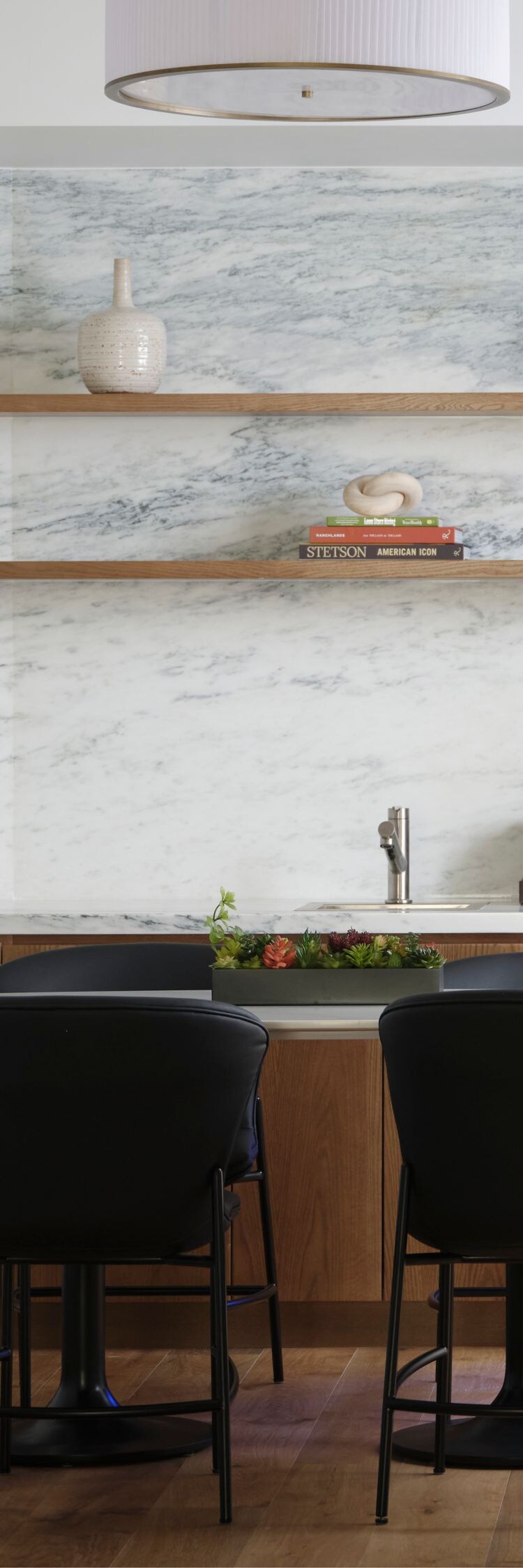 Suite dining area with marble backsplash