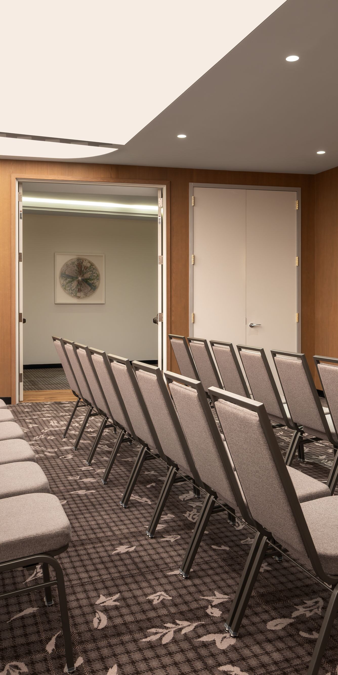 Meeting space with theater seating and TV