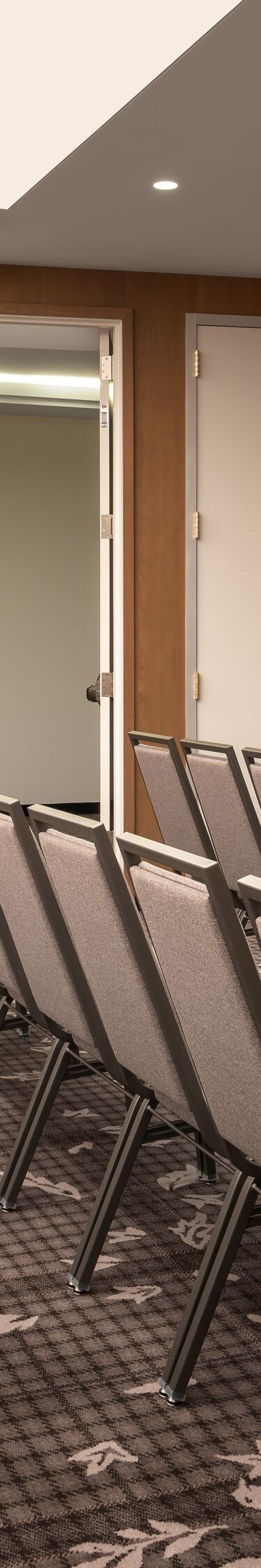 Meeting space with theater seating and TV