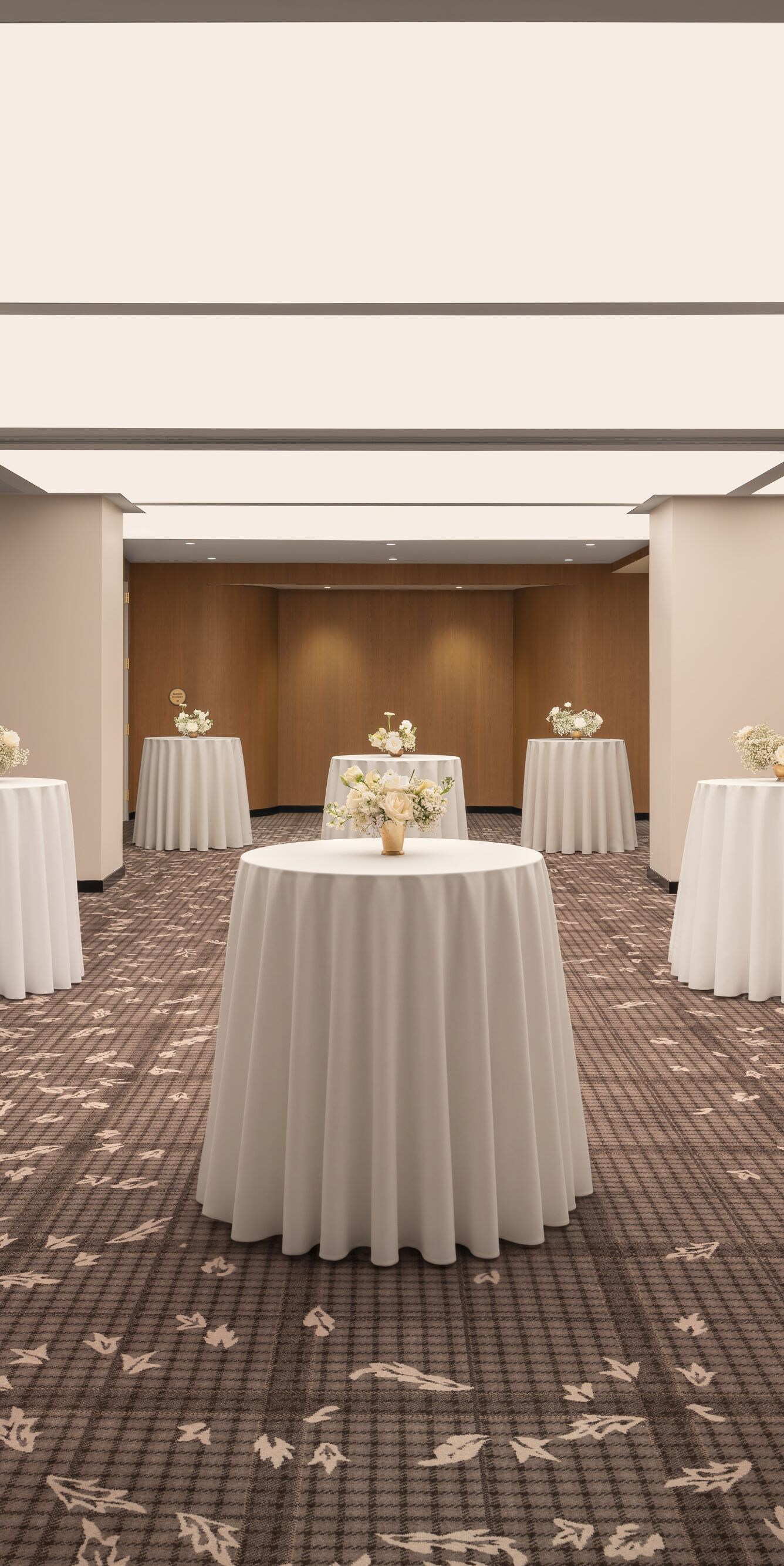 Event space with cocktail tables and decor
