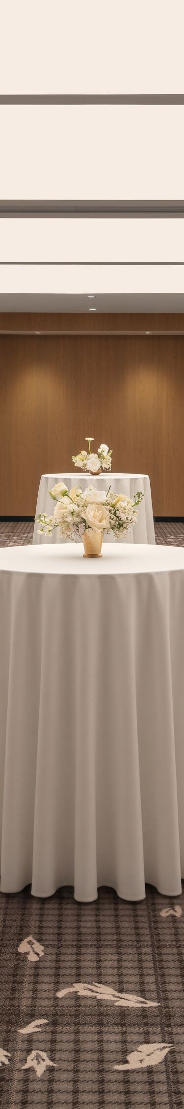 Event space with cocktail tables and decor