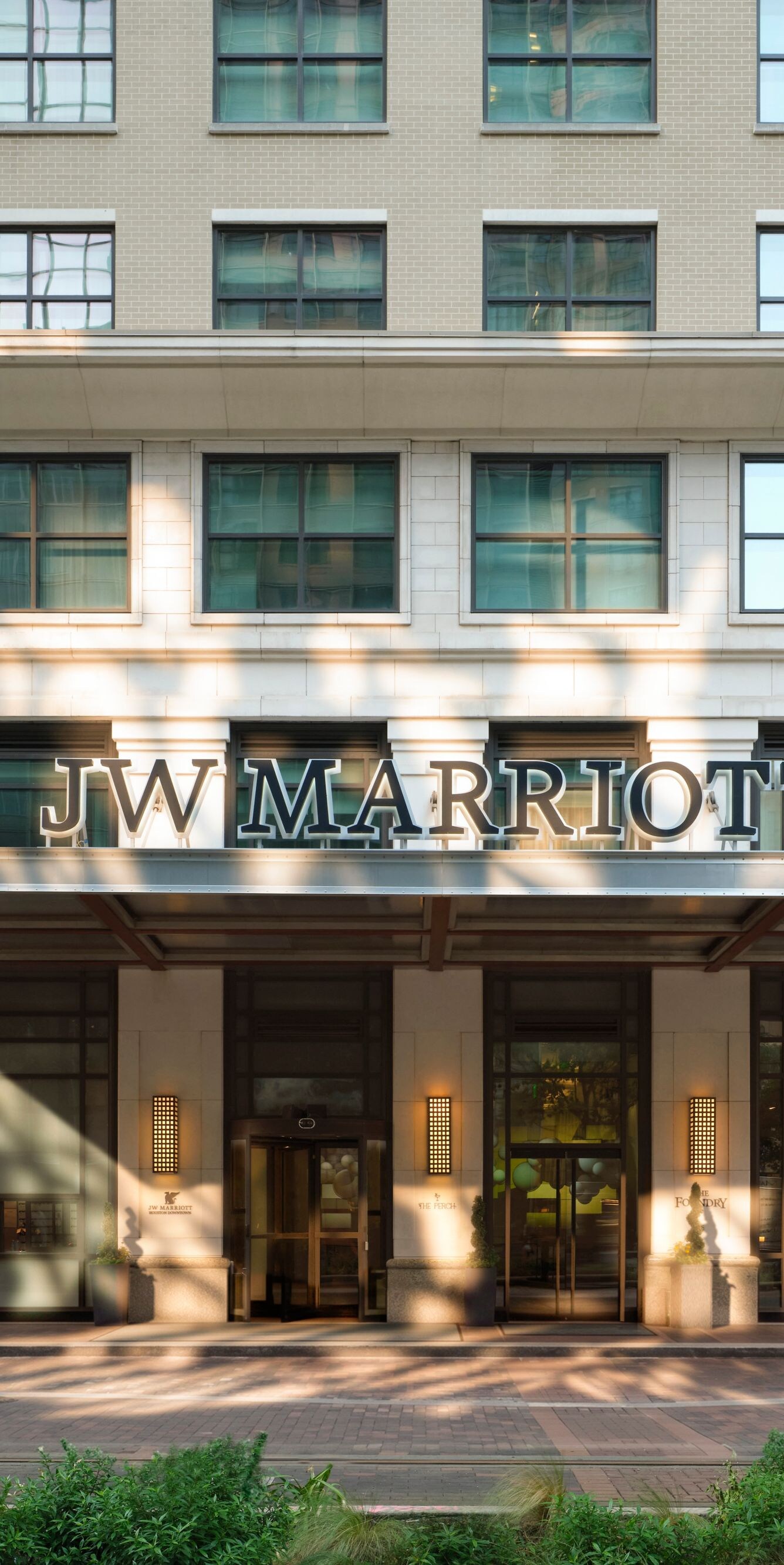 JW Marriott exterior with canopy entrance